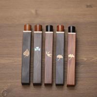 Caja De Almacenamiento De Incienso De Madera De Sándalo Negra Tubo De Incienso Corto Oval Figura De Tesoro En La Palma Juguete De Madera - details 0
