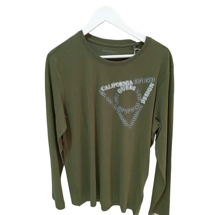 Camiseta Guess manga larga para hpmbre ,cuello redondo ,logo ,100%algodon.talla L - 1