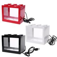 Acuario Pequeño Con Lámpara LED Iluminada En Forma De Pez Miniatura Con Paisaje Marino Y Algas Juguete De Plástico Para Decoración De Escritorio Tamaño 12x8x9.5cm Colores Rojo Negro Blanco - details 0