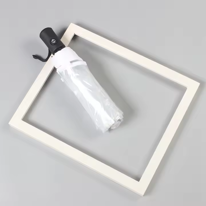Paraguas plegable a prueba de viento para hombres y mujeres, apertura y cierre automático, compacto y resistente, paraguas plegable transparente, paraguas transparente de tres pliegues totalmente automático - 1