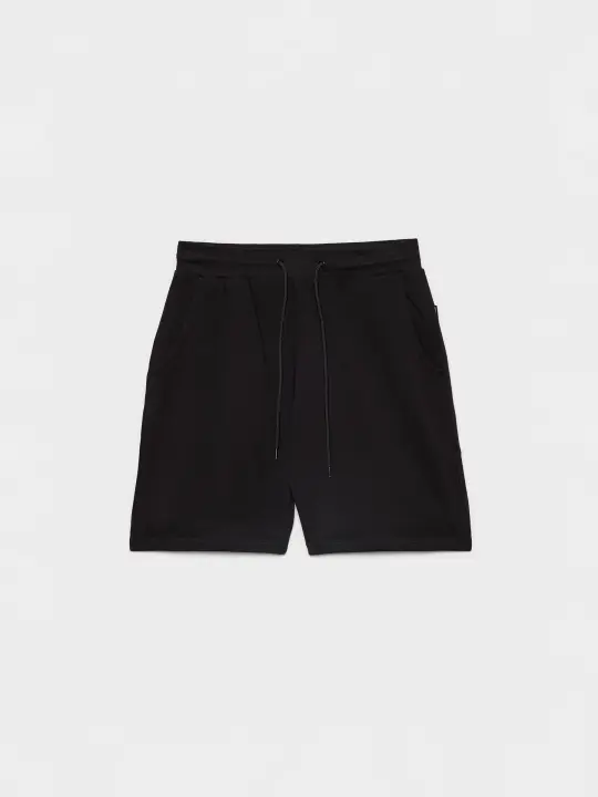 Bermuda básica estilo jogger con bolsillos al bies INSIDE - 1