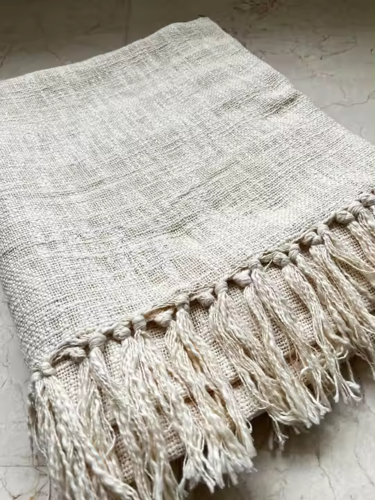 Manta para sofá o cama de 100% algodón con flecos 125x170 cm de la marca Origen - 1