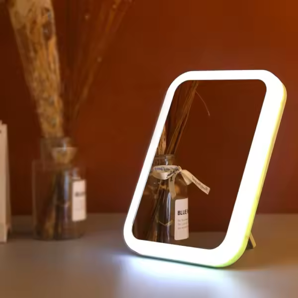 Espejo de maquillaje portátil con control táctil + iluminación LED - 1