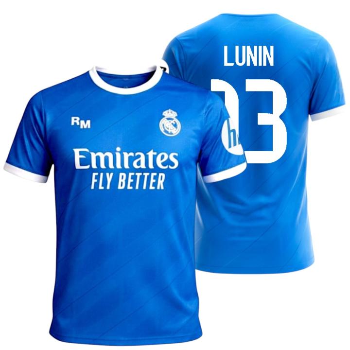 Real madrid - official replica third kit |   Season 25-26 |   Blue color with white details |   Name and dorsal lunin 13 |   Breathable technical fabric |   Slim fit |   Fans and collectors