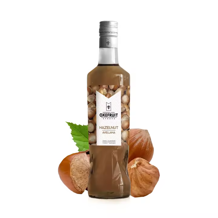 SIROPE DE AVELLANA Oxefruit Professional Mixers. Producido a partir de concentrado de avellana, con auténtico sabor, creado para la elaboración de cócteles y bebidas no alcohólicas como mocktails, batidos y también para repostería. - 1