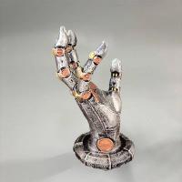 Figura de mano mecánica en resina , soporte para mandos de juego - details 14