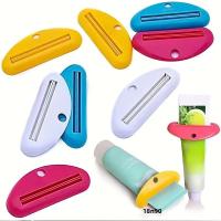 4pcs/pack Sujetadores De Tubo De Pasta De Dientes Plásticos En 4 Colores Soporte Para Tubo De Pasta De Dientes Lindo Y Útil - details 1