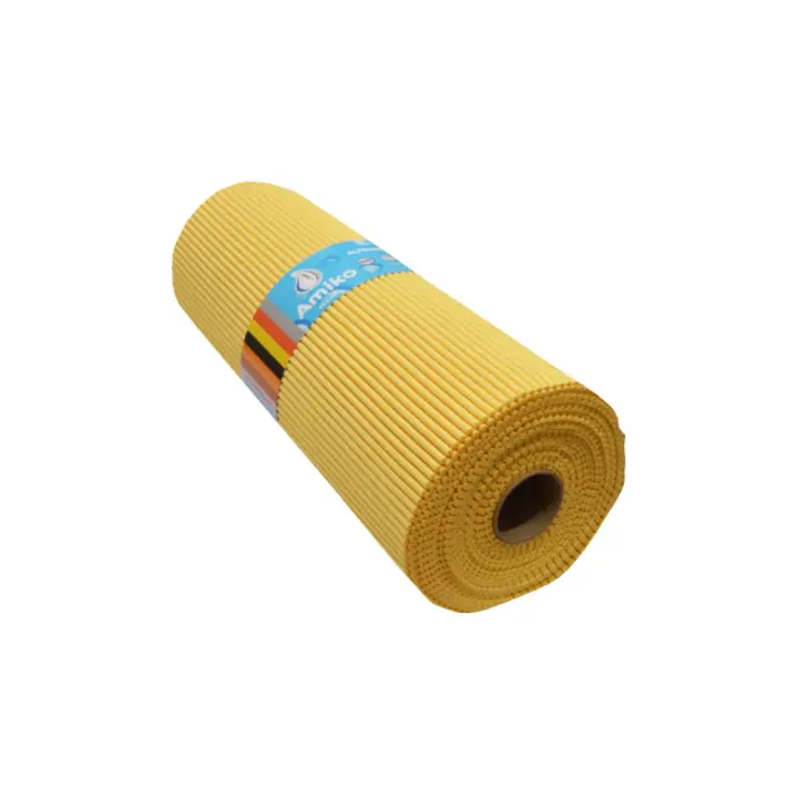 ROLLO DE ALFOMBRA ANTIDESLIZANTE ABIERTO AMARILLO AMIKO DE 12Mx65CM - 1