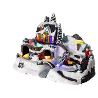 XOCOTŌ® Pueblo de navidad "Chefchaouen"  Escena navideña luminosa con niños jugando delante de la casa de Papá-Noel  37.5x21.5x25.5 cm - details 3