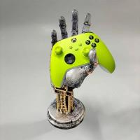 Figura de mano mecánica en resina , soporte para mandos de juego - details 3