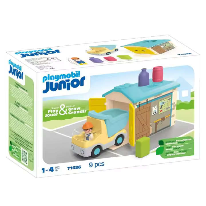 Playmobil junior (71686) camion basculante de obras con camionero obrero y garaje para transporte de material de construccion, camioneta, camión volquete con formas encajables de colores para encajar - 1