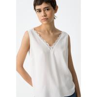 Top Cosmo Blanco Tiffosi. El Top Cosmo Blanco de Tiffosi combina elegancia y sencillez en una prenda sin mangas de jersey. - details 0
