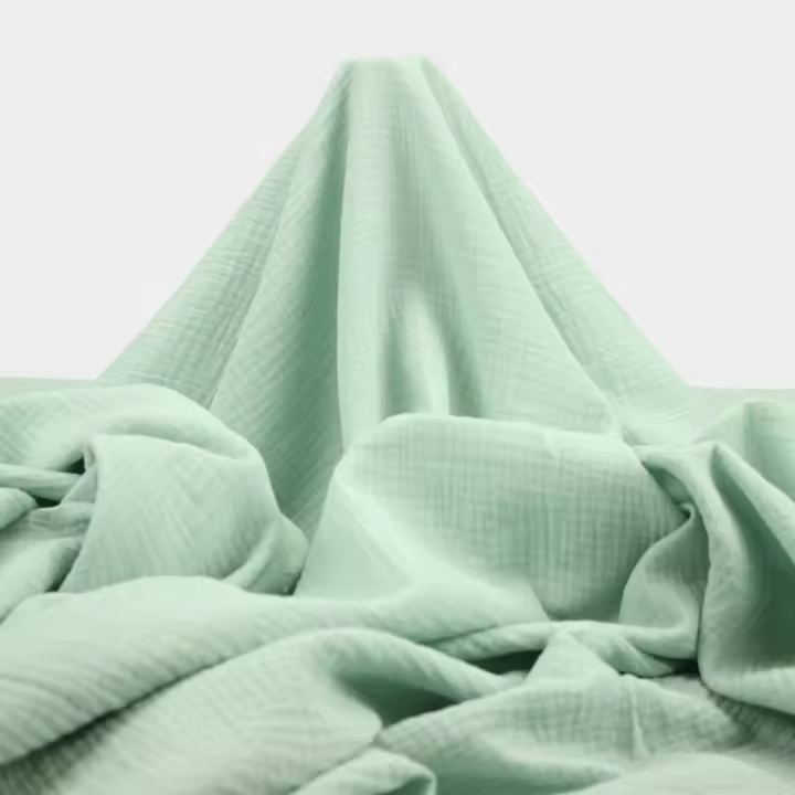 Almacenes Casa Angel ELA MUSELINA VERDE EMPOLVADO DE ALGODÓN ORGÁNICO SERIE ANKAWA, ANCHO 130cm - 1