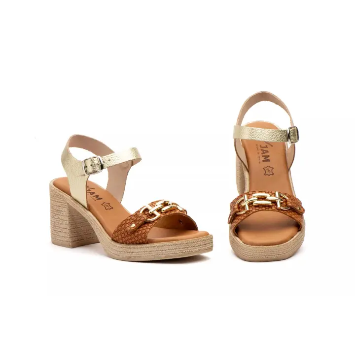 FX-2579 Platino Hecho en España Sandalias Mujer Piel Platino Tacón Hebilla Numeración: 35-41 Marca: JAM Sandalias de tacón en tonos marrón y dorado, con un diseño sofisticado y detalles trenzados en la parte delantera. Fabricadas en piel - 1