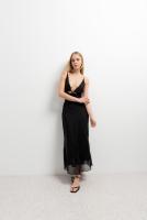 PuntoSalao Vestido midi estampado lunares para mujer tirante finos color negro vestido encarna la fusión perfecta entre clasicismo y tendencia, ofreciendo un diseño que realza la figura y aporta un toque de sofisticación - details 1