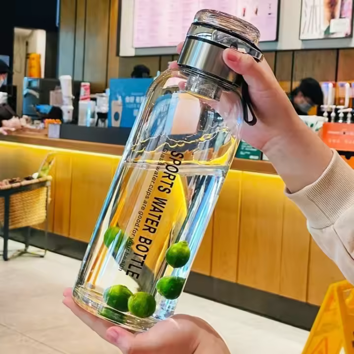 Botella De Agua De Vidrio Grande 2L Con Tapa Transparente Resistente a Fugas Para Beber Jugo Y Té Portátil Para Exteriores - 1