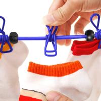 Paquete de 2 tendedero portátil con 12 pinzas para la ropa, tendedero retráctil portátil, uso exterior, Interior y de viaje, elástico y a prueba de viento - details 0