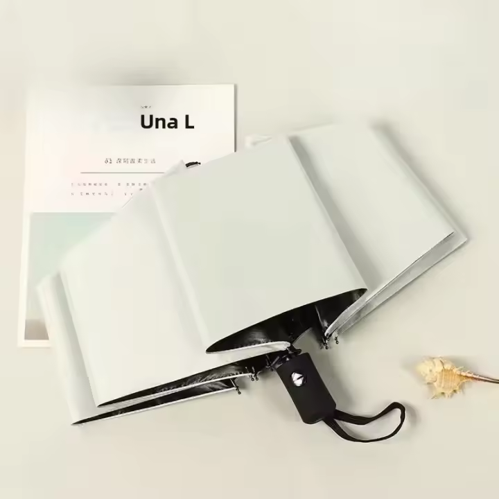 Parasol Automático Resistente Al Viento Para Hombres Y Mujeres Con Capa Negra Anti-UV Plegable 3 Veces Para Protección Contra Lluvia Y Sol 8 Viles Lujo - 1