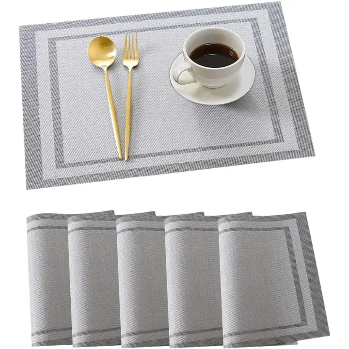 Juego de 6 manteles individuales de PVC antideslizantes, resistentes al calor, lavables y tejidos para mesa de cocina (11,8 x 17,7 pulgadas, color plateado) - 1