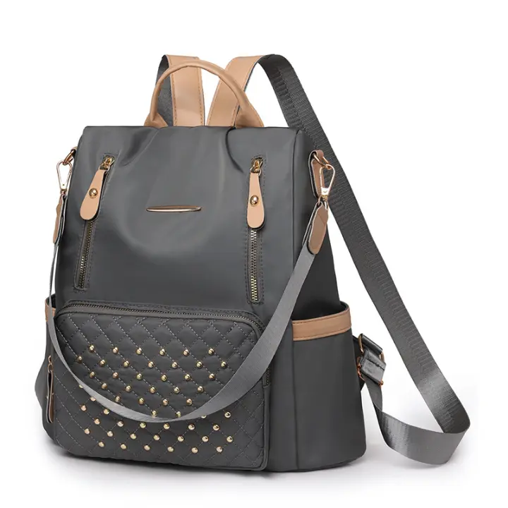 Mochila escolar para estudiantes con forma de diamante de gran capacidad, moderna, sencilla, informal y versátil, mochila para mujer con incrustaciones de remaches. - 1