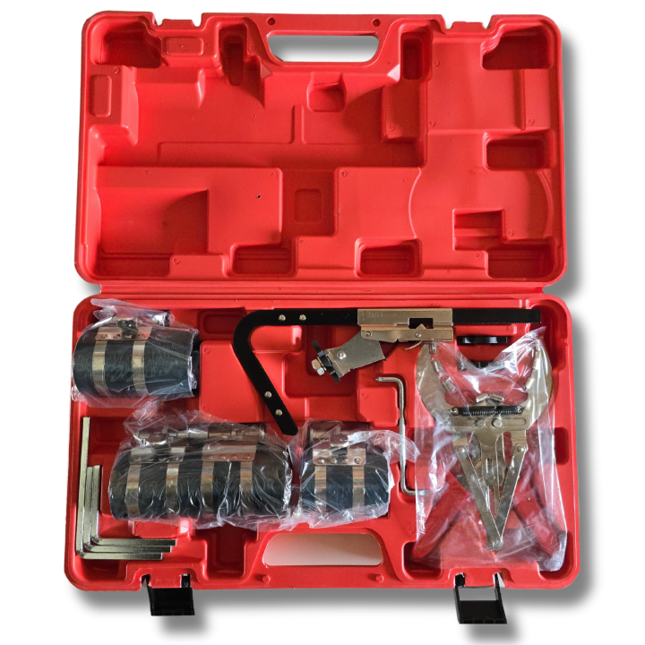 Juego de herramientas para ceñir y segmentar aros de pistón con ceñidores de 75 mm (53-125 mm), 100 mm (90-175 mm) y 150 mm (90-175 mm), tenaza para segmentos de 50-100 mm y adaptador con placas limpiadoras.