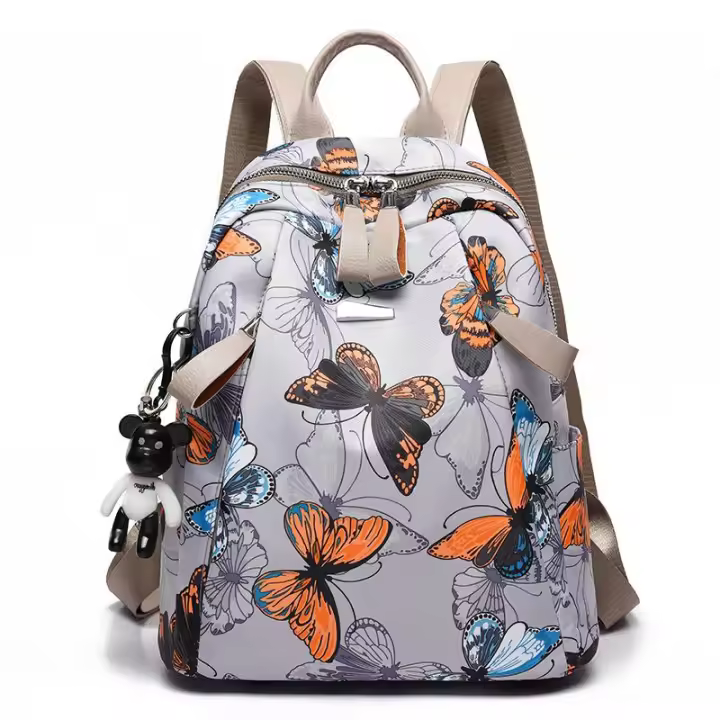 Mochila antiladrones con estampado de mariposas y plumas, tela Oxford para mujer, mochila informal de viaje impermeable, mochila de gran capacidad para mujer para adolescentes - 1