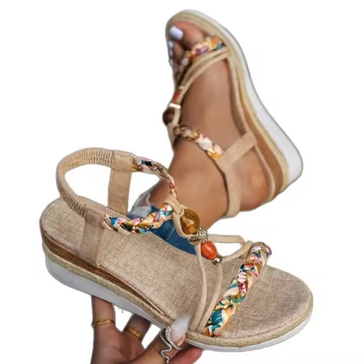 Perfect for the beach, these casual, bohemian-inspired women's wedge sandals feature hand-woven multicolor elastic and an open toe. - 1