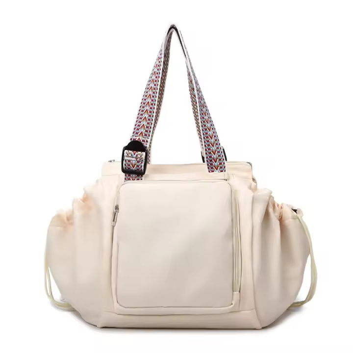 Bolsa de cuna de nylon versátil-organizador de viaje multifuncional, correa ajustable, cierre de cremallera, diseño plegable, disponible en caqui, azul claro, gris, negro - 1