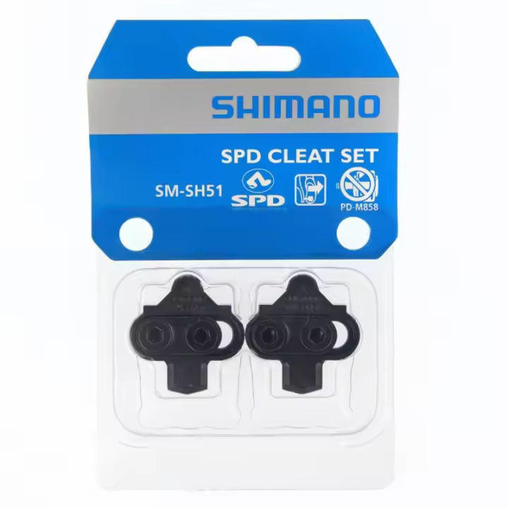 SHIMANO | Calas De Pedales SPD SH51 - Calas de desenganche simple para pedales SPD.
Se sueltan sólo cuando se gira el talón hacia fuera.
Juego de calas con gran superficie de apoyo y solidez para - 1