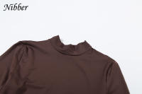 Conjunto Elegante Para Mujer Nibber 2 Piezas Suéter De Manga Larga Con Cuello Redondo Y Falda Acolchada Con Borlas Moda Urbanita - details 5