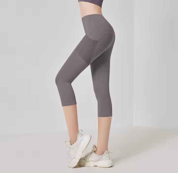 Pantalones de yoga recortados con bolsillos laterales para mujer, cintura alta, color melocotón, para gimnasio, levantamiento de cadera, mallas deportivas - 1