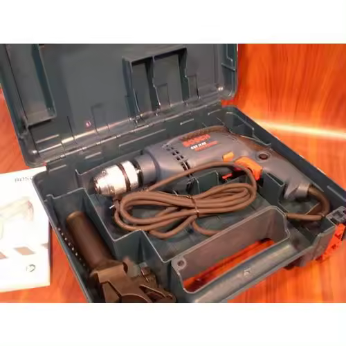 Taladro percutor BOSCH 600 w. 13 mm. con maletin GSB13RE - 1