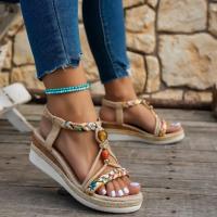 Perfect for the beach, these casual, bohemian-inspired women's wedge sandals feature hand-woven multicolor elastic and an open toe. - details 1
