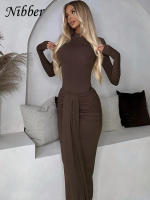 Conjunto Elegante Para Mujer Nibber 2 Piezas Suéter De Manga Larga Con Cuello Redondo Y Falda Acolchada Con Borlas Moda Urbanita - details 15