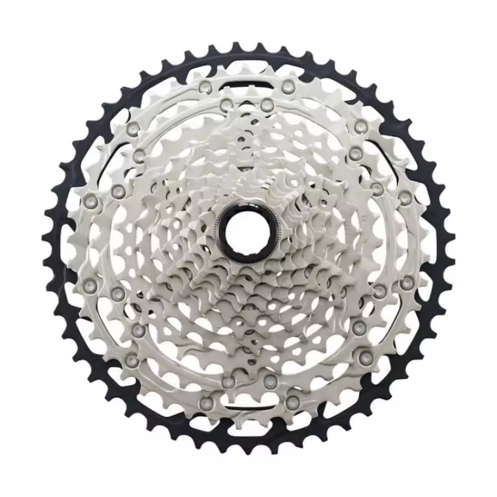 SHIMANO | Cassette SLX M7100 12v - Con su construcción BEAM SPIDER, el cassette SLX M7100 de 12 velocidades recorta peso, al tiempo que incrementa otra marcha los desarrollos de MTB de SHIMANO - 1