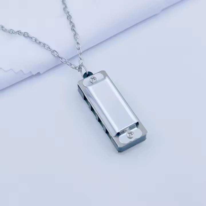 Nueva Armónica De 8 Tonos Con 4 Agujeros Mini Armónica De Metal Instrumento De Viento Cadena Juguete Musical Regalo - 1