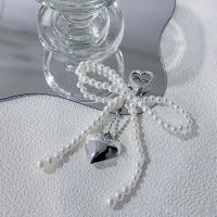 Llavero Aesthetic Y2K Con Perla Dulce Y Lazo Corazón Para Niñas Accesorios De Bolso Con Colgante De Corazón Y Lazo Coreano - details 0