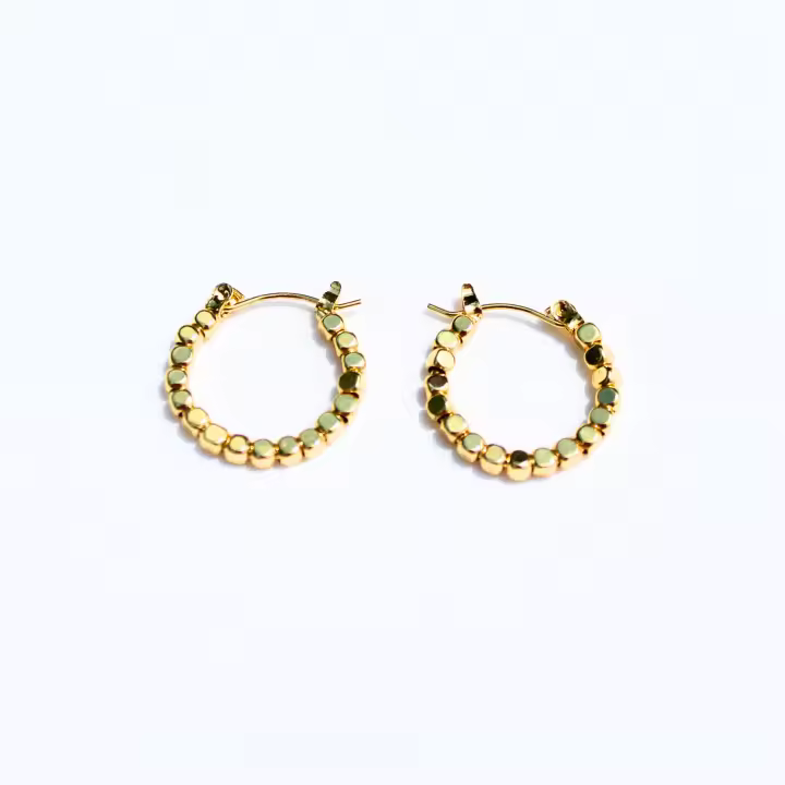 Aros Elegantes Dorados con Piedras Móviles - Estilo y Elegancia Cautivadora - 1