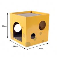 Rascador en forma de casa de cartón amarillo (30x30x30 cm) con agujeros para que tu gato se divierta rascando, explorando y descansando. Su diseño práctico y compacto brinda comodidad y diversión, manteniendo a tu gato entretenido y activo por horas. - details 1