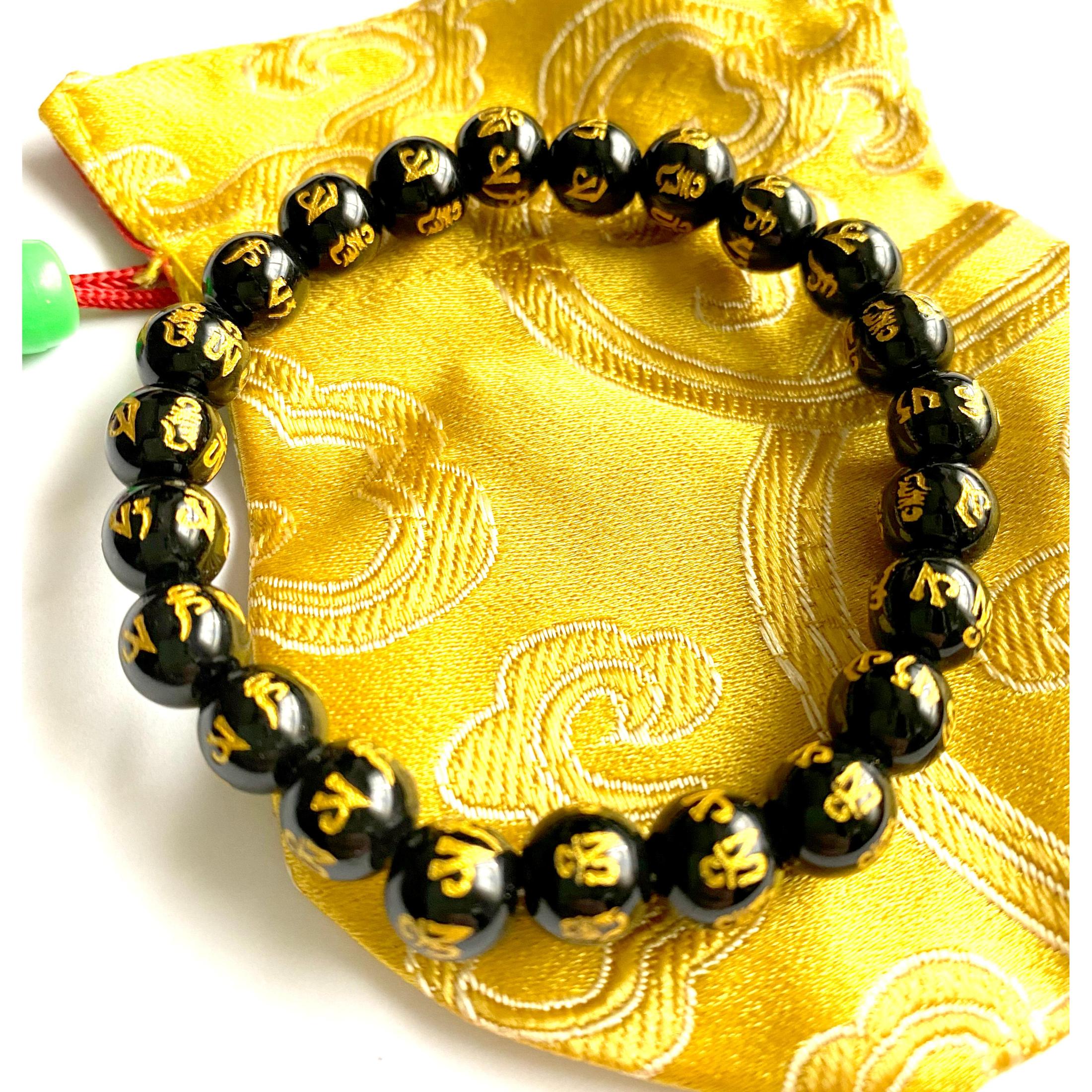 Pulsera cuentas Nepal, Hecho a mano, Artesania del Tibet, Negra con dibujos dorados y bolsa Amarilla, Conecta+y+Compra, Tradicional
