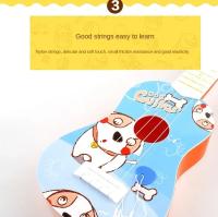 Ukelele Para Niños Juguetes Musicales 4 Cuerdas Pequeño Guitarra Instrumento Educativo Montessori Regalo De Aprendizaje De Música - details 3