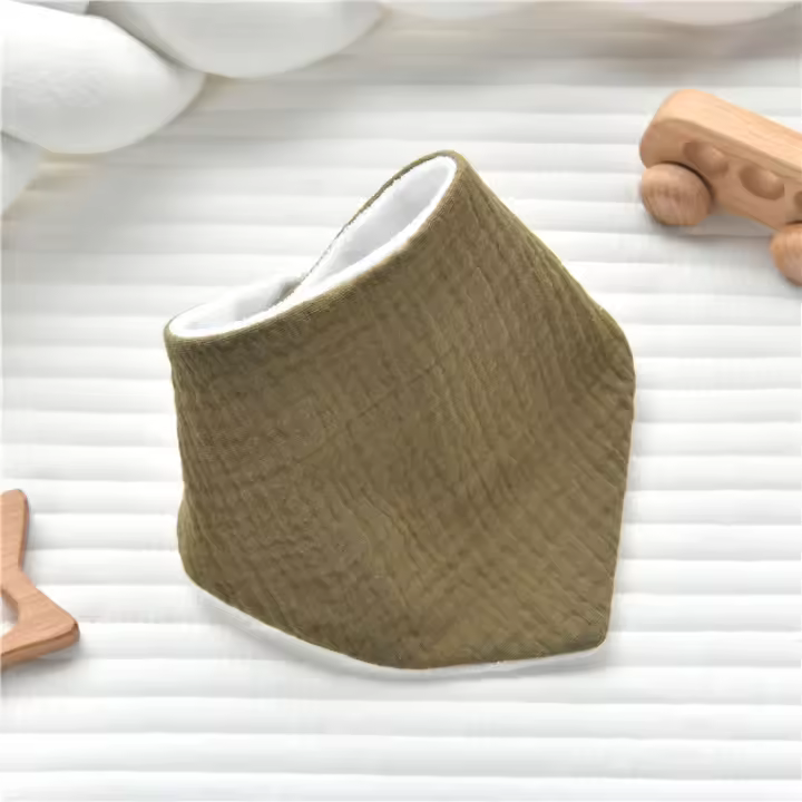 Babero de tela de rizo crepé para recién nacidos de gran venta de INS para evitar que escupa leche con una capa impermeable de toalla triangular - 1