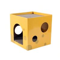Rascador en forma de casa de cartón amarillo (30x30x30 cm) con agujeros para que tu gato se divierta rascando, explorando y descansando. Su diseño práctico y compacto brinda comodidad y diversión, manteniendo a tu gato entretenido y activo por horas. - details 0