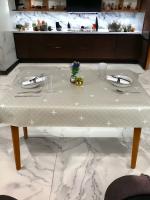 Mantel Hulehule Tex - Hule PVC Estampado Estrellas Blancas Fondo Beige Resistente a Manchas Impermeable 140cm Ancho - details 1