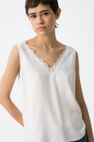Top Cosmo Blanco Tiffosi. El Top Cosmo Blanco de Tiffosi combina elegancia y sencillez en una prenda sin mangas de jersey. - details 6