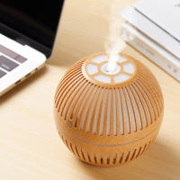 Nueva y creativa máquina de aromaterapia de aceite esencial de grano de madera hueco de estilo retro redondo creativo mini humidificador USB para el hogar, grano de madera claro - details 1