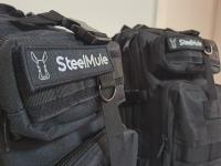 Steel Mule Mochila Grande Táctica Militar Color Negro 38L, impermeable y resistente. Ideal para operaciones largas, senderismo, airsoft y gym. Sistema MOLLE, 5 compartimentos, velcro para parches. Cómoda, ligera y reforzada. Ideal para viaje, moto, montañ - details 3