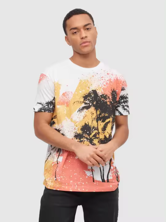 Sumérgete en la frescura tropical con esta camiseta de estampado exuberante INSIDE - 1