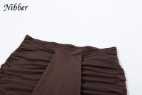 Conjunto Elegante Para Mujer Nibber 2 Piezas Suéter De Manga Larga Con Cuello Redondo Y Falda Acolchada Con Borlas Moda Urbanita - details 8