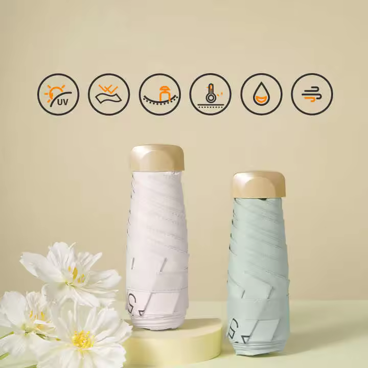 Miniparaguas de viaje con estuche, pequeño y compacto, con protección UV para sol y lluvia, ligero y resistente al viento, para mujeres, hombres y niños. - 1
